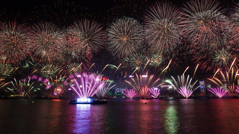 Fireworks light up Hong Kong's iconic skyline as revellers celebrate the arrival of 2019, in China, 1 January 2019