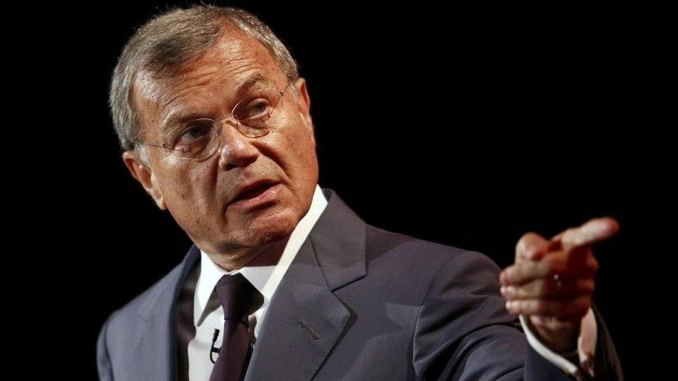 Martin Sorrell pointing on a stage