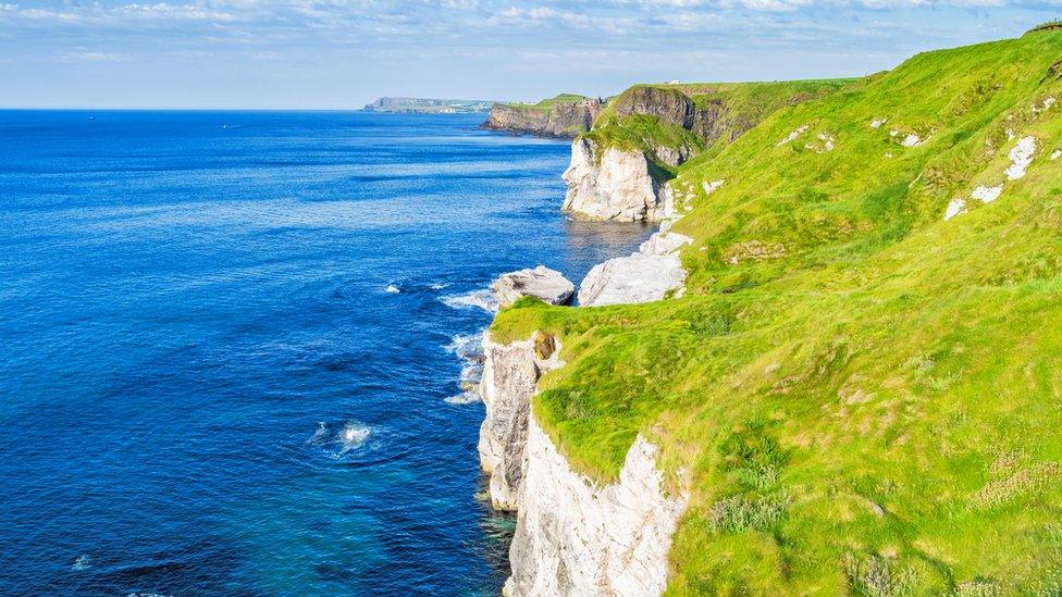 Stock photograph of the cliffs at The Whiterocks near Portrush Northern Ireland UK on sunny day.