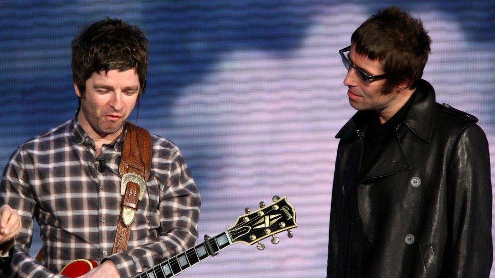 Brothers Noel and Liam Gallagher pictured together in 2009, the year Oasis split