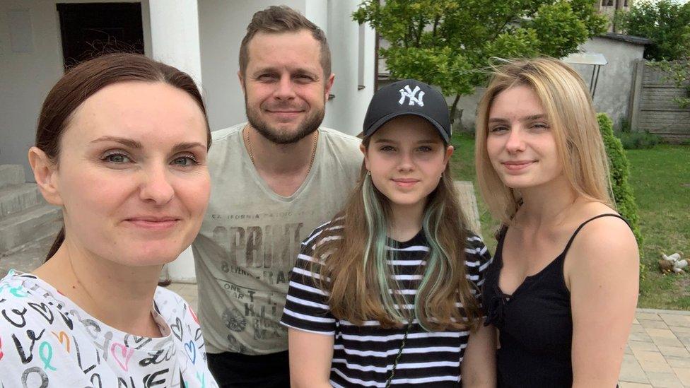 Iryna (left) her husband and daughters Yustyna and Yuiiana