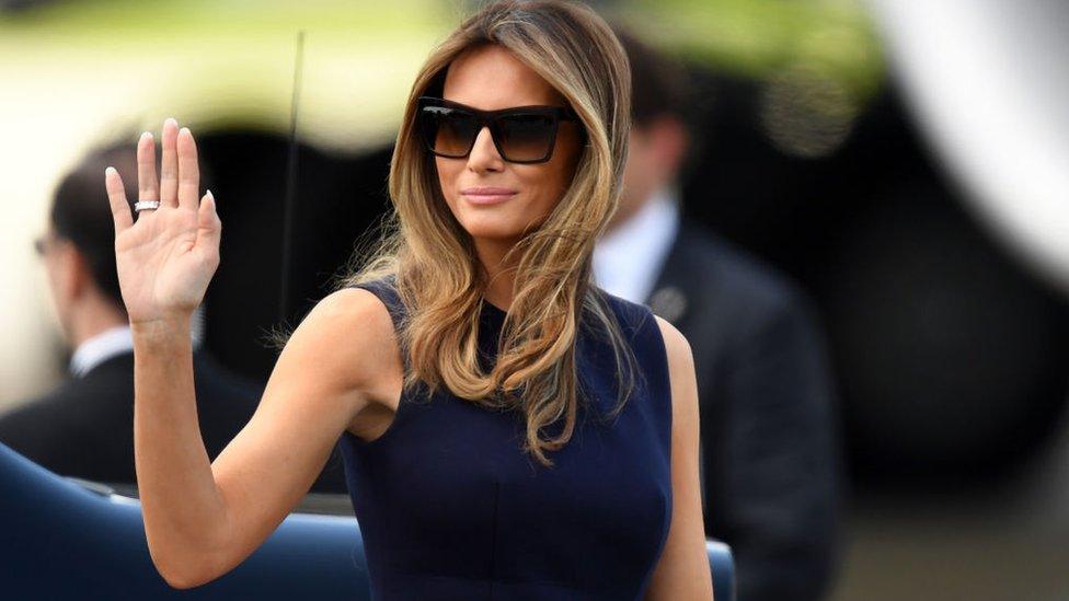 US First Lady Melania Trump pictured wearing sunglasses and waving