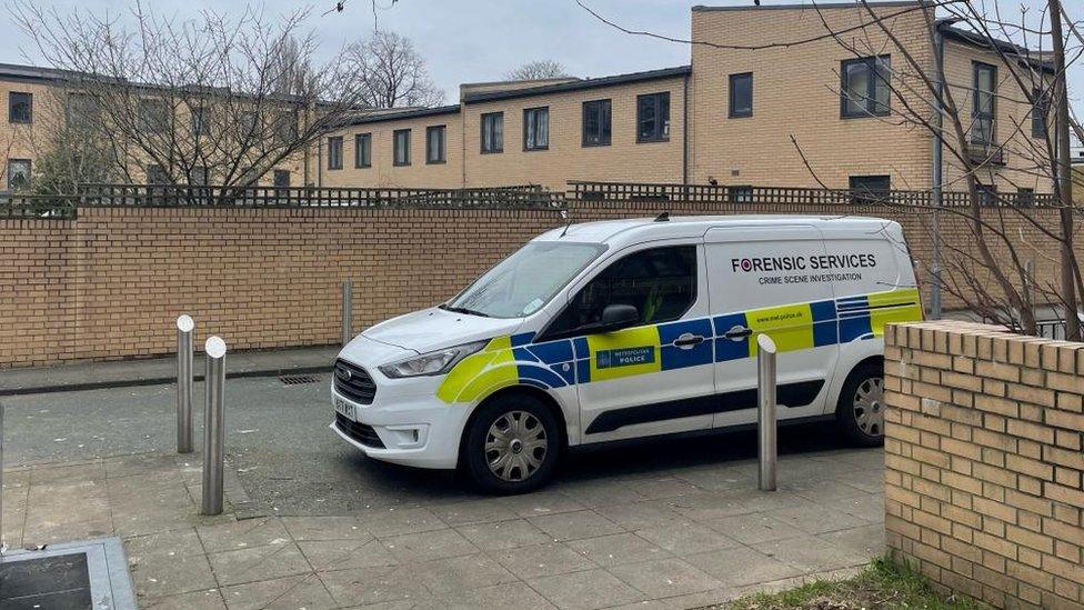 Police forensics van at scene