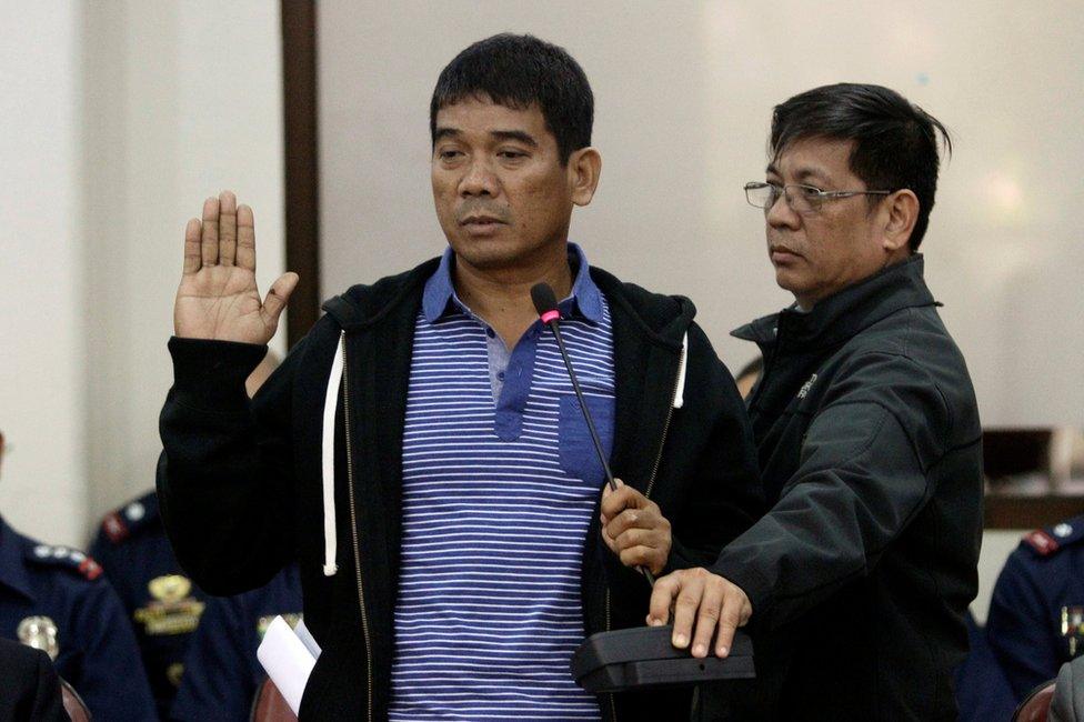 Ronnie Dayan, the former aide of Senator Leila de Lima, takes an oath during a Congressional committee hearing on illegal drugs trade, inside the National Penitentiary at the House of the Representatives in Quezon city, Metro Manila, Philippines 24 November 2016.