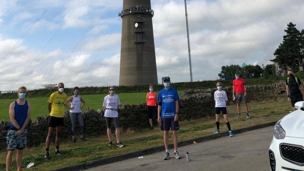 Andy's final run from Emley Mast to Castle Hill in Huddersfield was done in lockdown style - complete with masks and social distancing