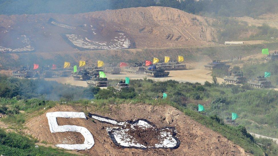 South Korean tanks participate in a joint live firing drill between South Korea and the US at the Seungjin Fire Training Field in Pocheon, 65 kms northeast of Seoul, on August 28, 2015.