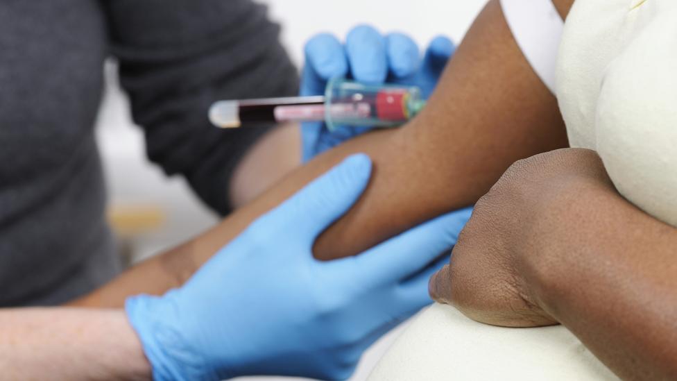 Woman having a blood test