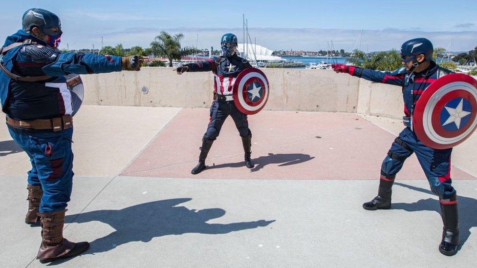 Three Captain America costumes.