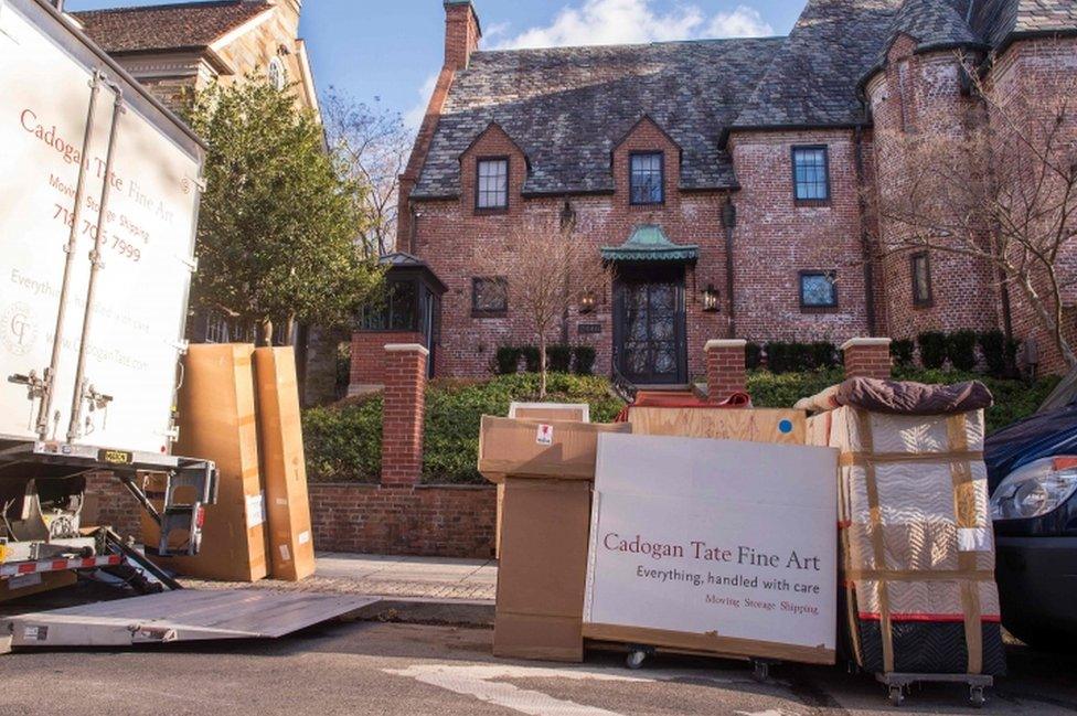 Moving trucks outside the Obama's home in late January, as he left office