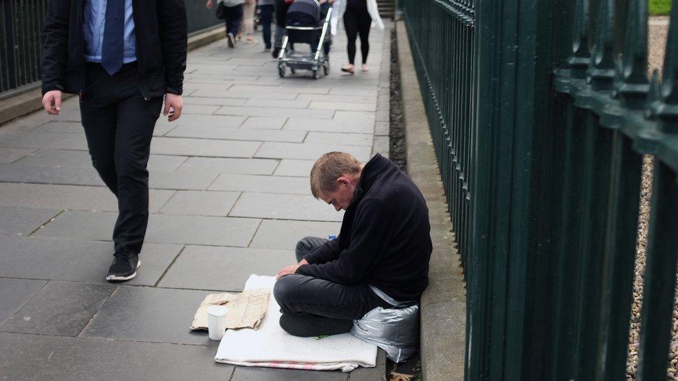 Man begging in the street