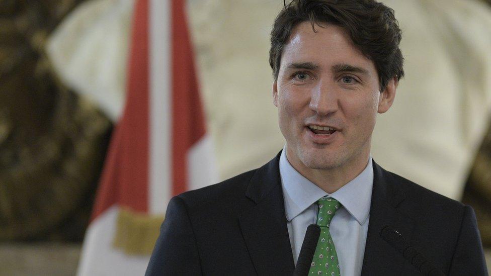 Prime Minister of Canada Justin Trudeau delivers a joint press conference with Argentine President Mauricio Macri (out of frame) after a meeting at Casa Rosada presidential palace in Buenos Aires on November 17, 2016