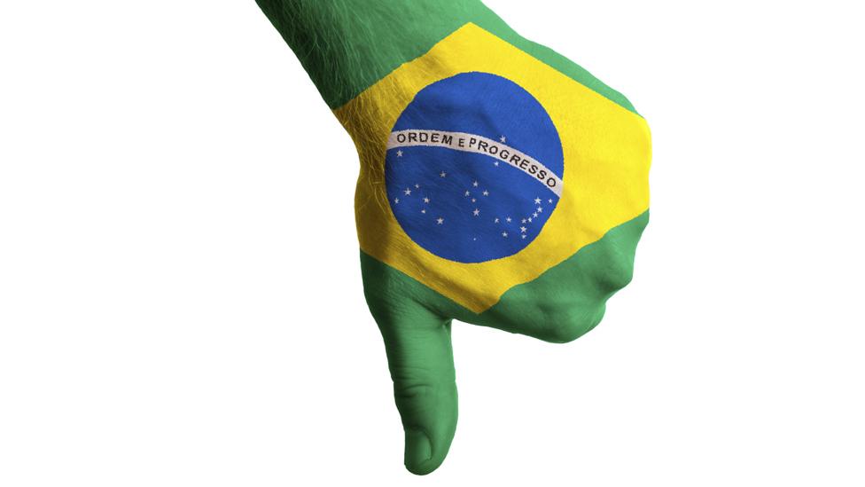 Thumbs down - hand is painted like a Brazilian flag