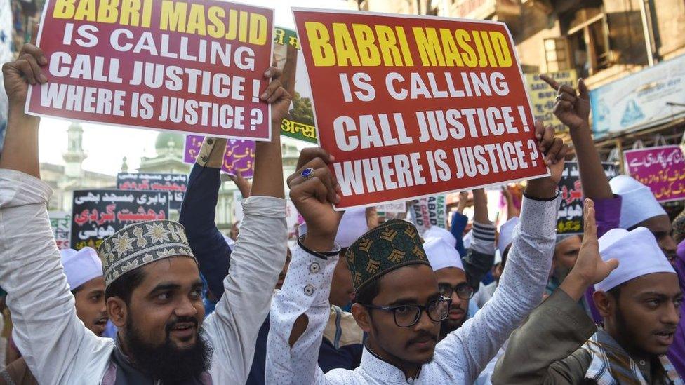 Indian Muslim supporters and activists take part in a protest in Mumbai on December 6, 2018 to mark the 26th anniversary of the demolition of the 16th Century Babri Masjid in Ayodhya