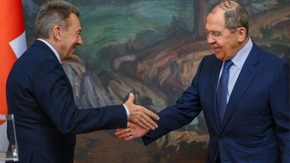 Russian Foreign Minister Sergei Lavrov and President of the International Committee of the Red Cross (ICRC) Peter Maurer shake hands during a news conference following their talks in Moscow, Russia March 24, 2022