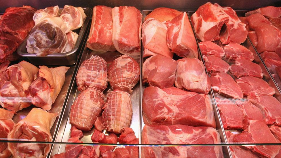 Meat displayed on a chilled shelf in a supermarket