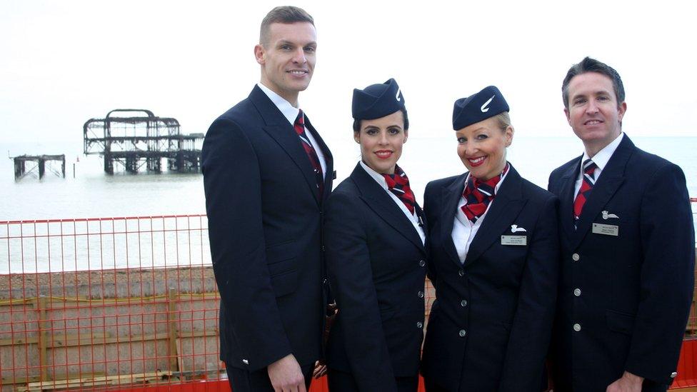 Air crew in front of pier