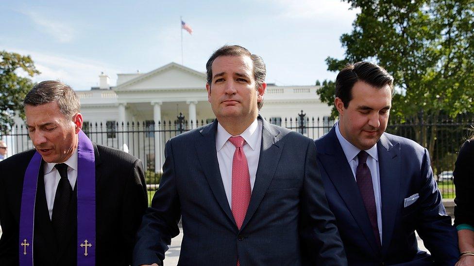 Ted Cruz prays in front of the White House.