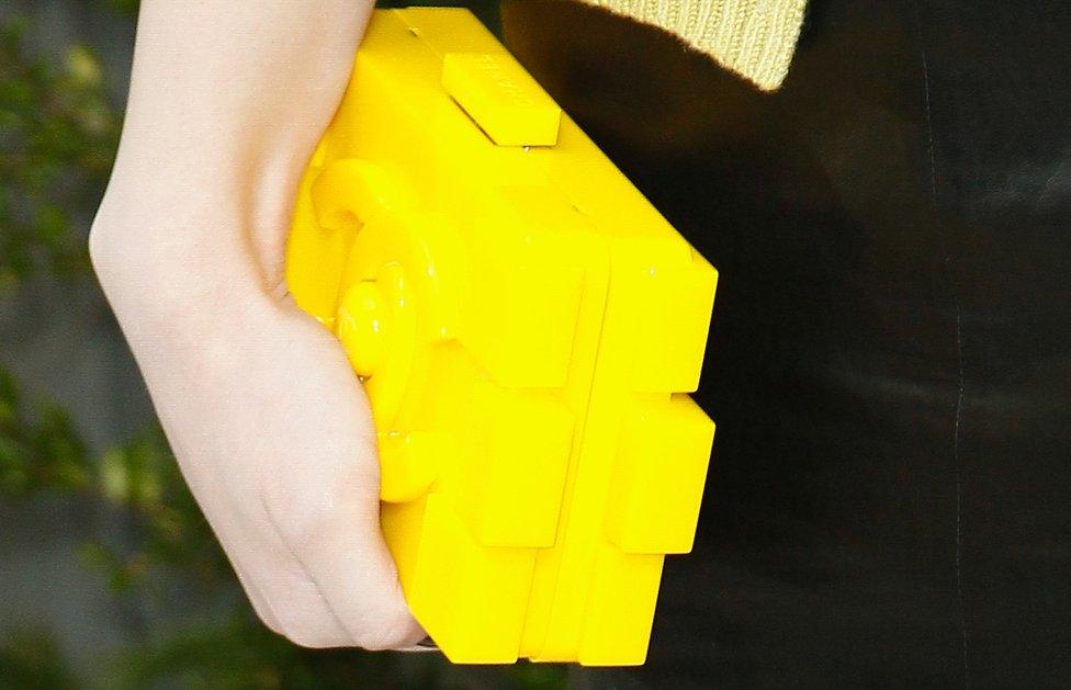 hand holding Chanel's Lego-inspired bag