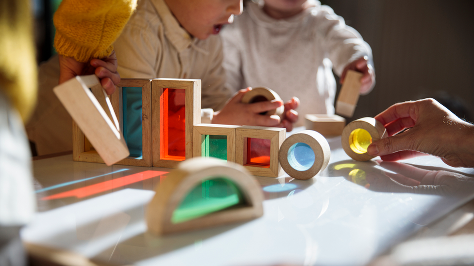 Children playing at table