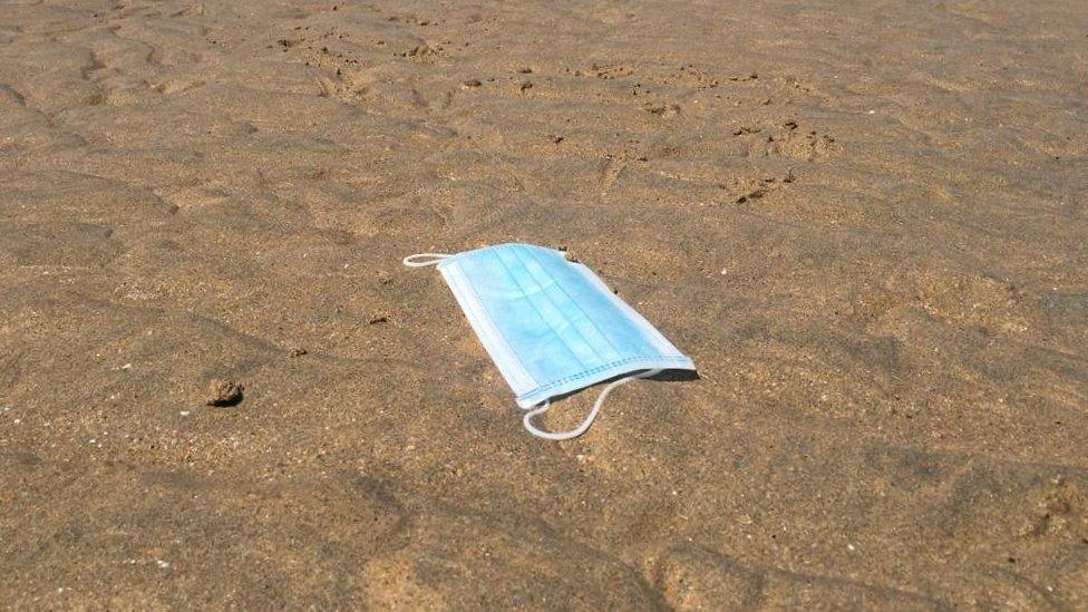 Facemask on beach