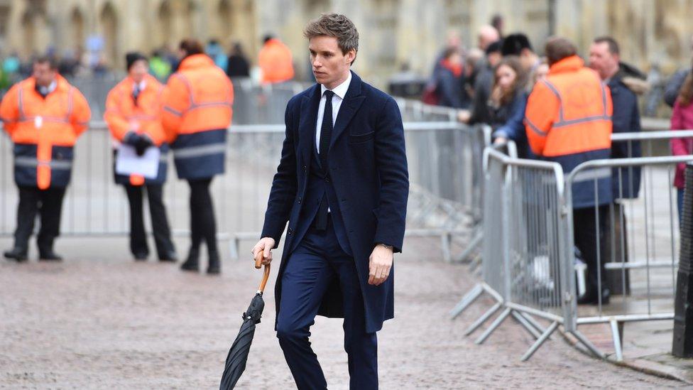 Eddie Redmayne arriving at funeral