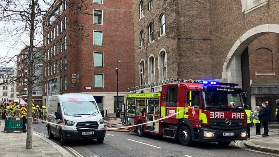 Image showing a fire engine and firefighters at the rear of the Old Bailey