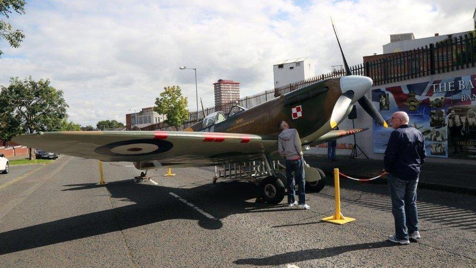 A World War Two Spitfire was brought to the unveiling of the mural in the Shankill area