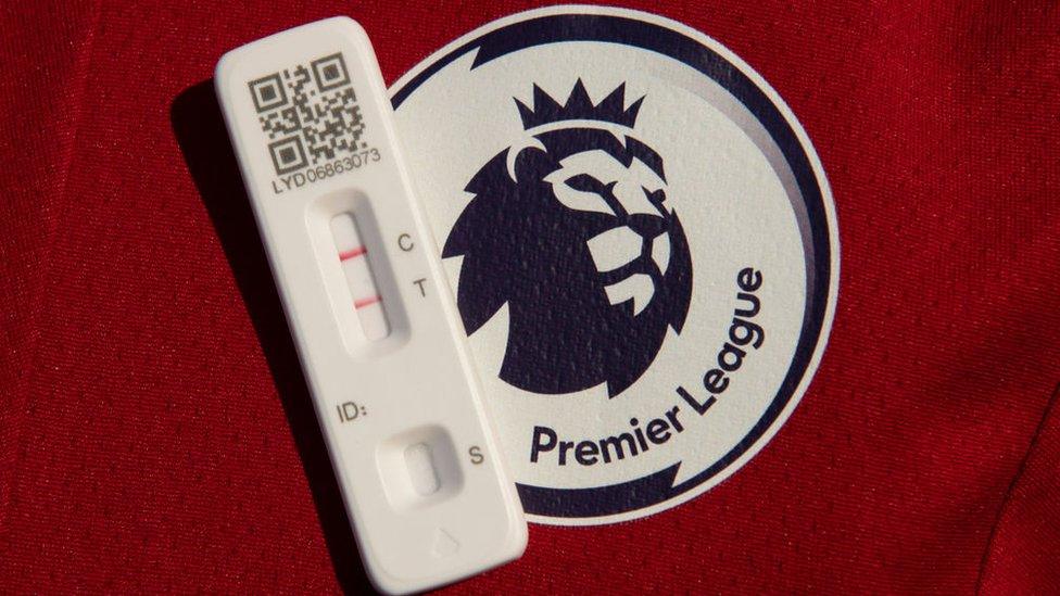 Premier League badge and LFT.