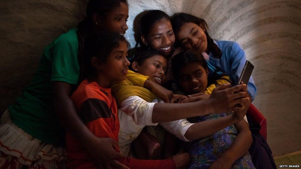 A group of Indian girls take a selfie