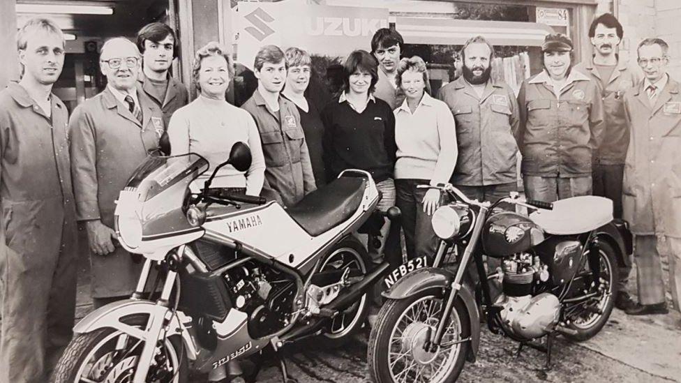 Peter Hammond Motorcycles workers outside the shop