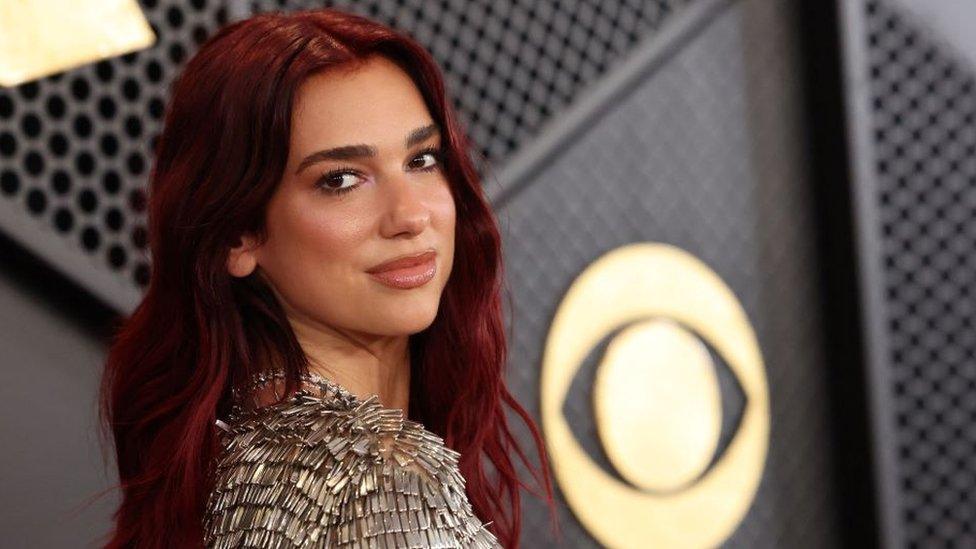 Dua Lipa on the red carpet at the Grammys