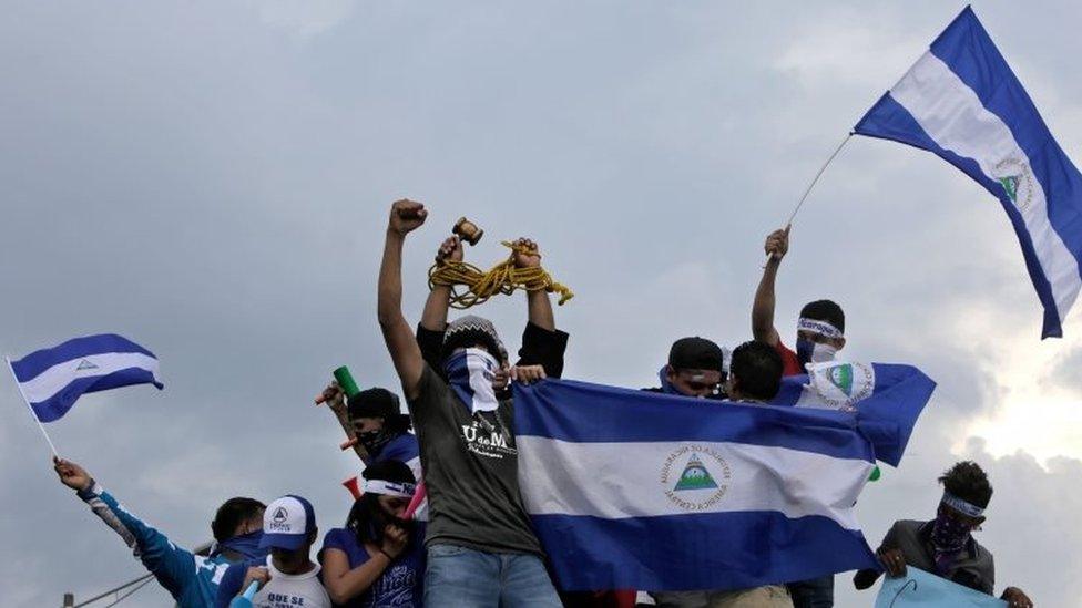 Anti-government demonstrators stage a protest demanding Nicaraguan President Daniel Ortega and his wife, Vice President Rosario Murillo, to stand down, in Managua in May 2018