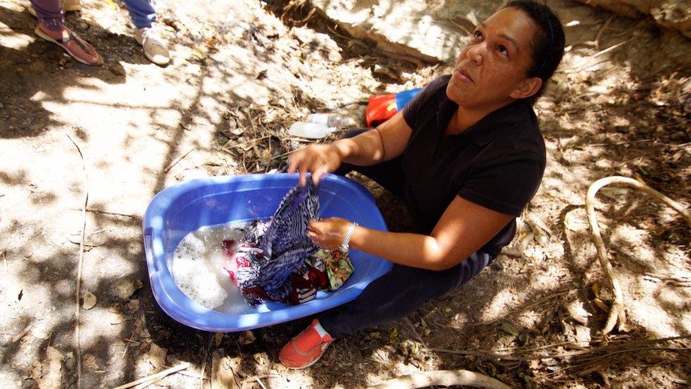 Soraya washing clothes