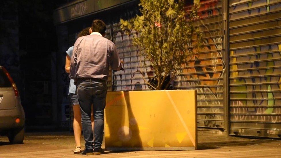 People are encouraged to engage in conversation on the streets of Athens, Greece