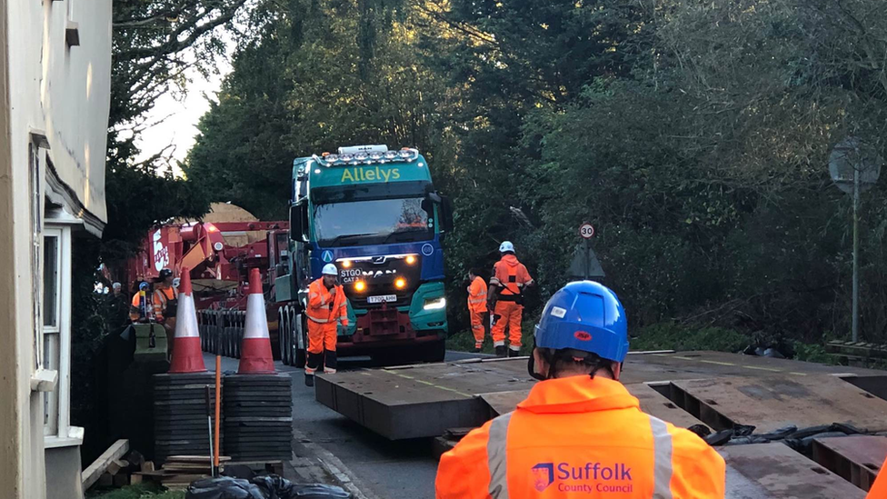 A lorry passing a bridge that was made on Brockford Street on the A140