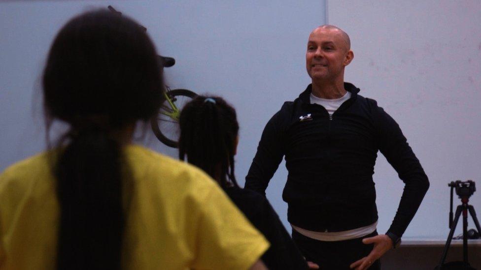 Martin Howland showing pupils ballet pose