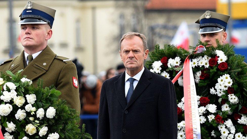 Former Polish Prime Minister and European Council President Donald Tusk lays a wreath at the Tomb of the Unknown Soldier, 11 November