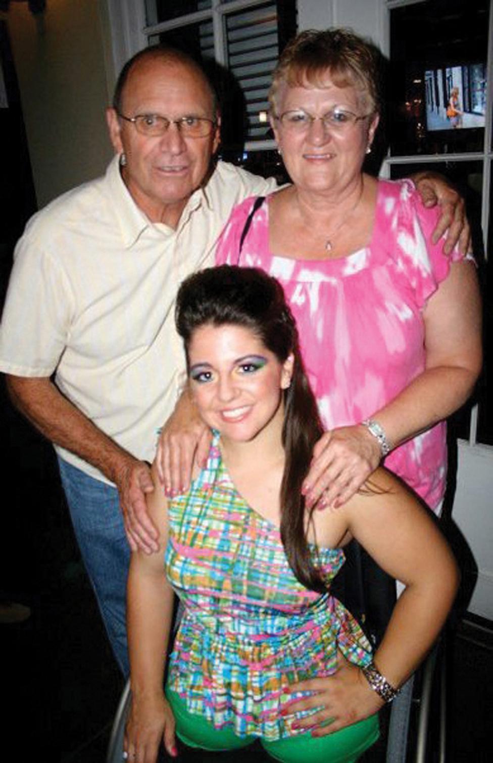 Jennifer with her parents, Sharon and Gerald Bricker