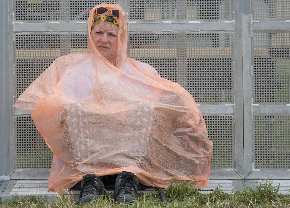 A festival-goer at Glastonbury in 2017