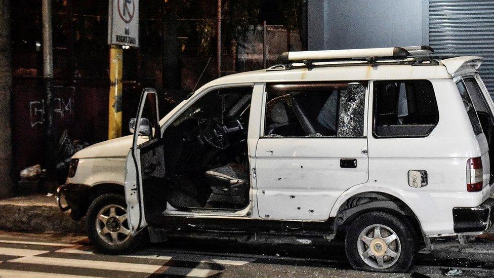 Vehicle with bullet holes