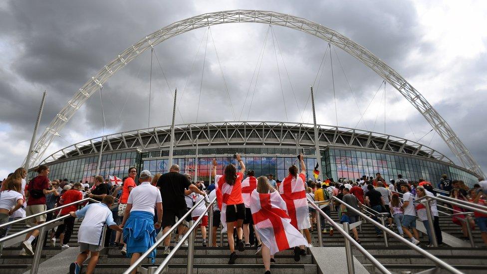 Fans at Wembley Stadium.