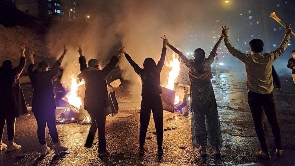 Women without headscarves protest in the north-western Iranian city of Sanandaj on 16 November 2022