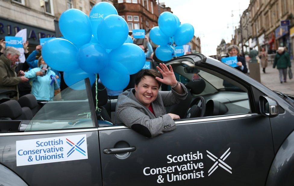 Ruth Davidson on the campaign trail in a car with balloons around her