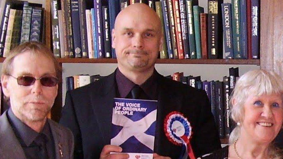 Stephen Goldsack holding BNP manifesto