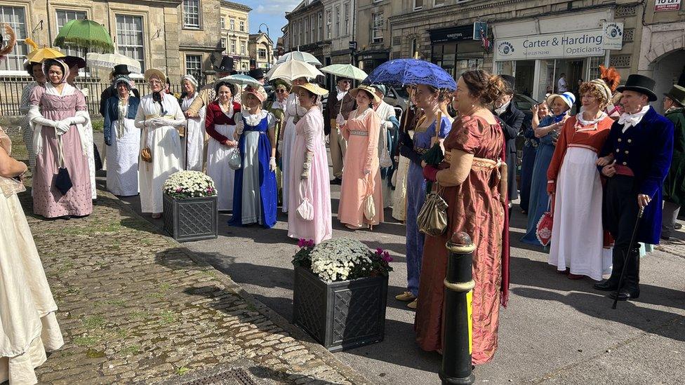 People in period dress