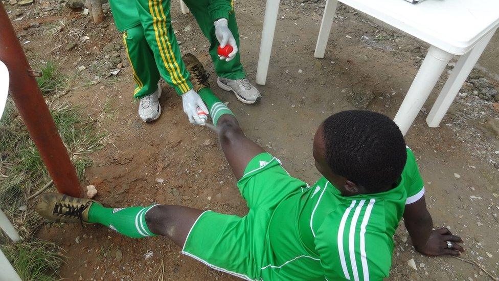 A former Boko Haram member being treated at a football training session in Nigeria