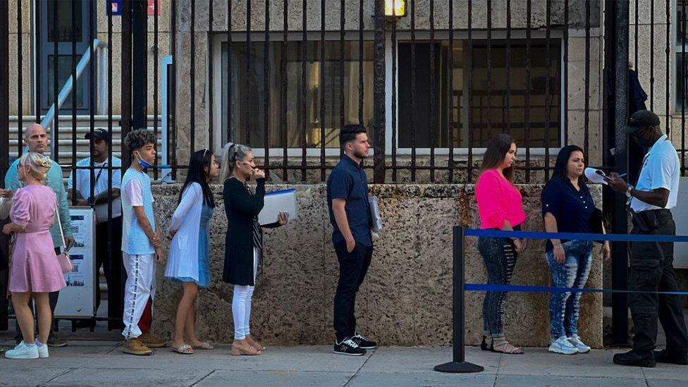 Cubans queue outside the US embassy in Havana on January 4, 2023