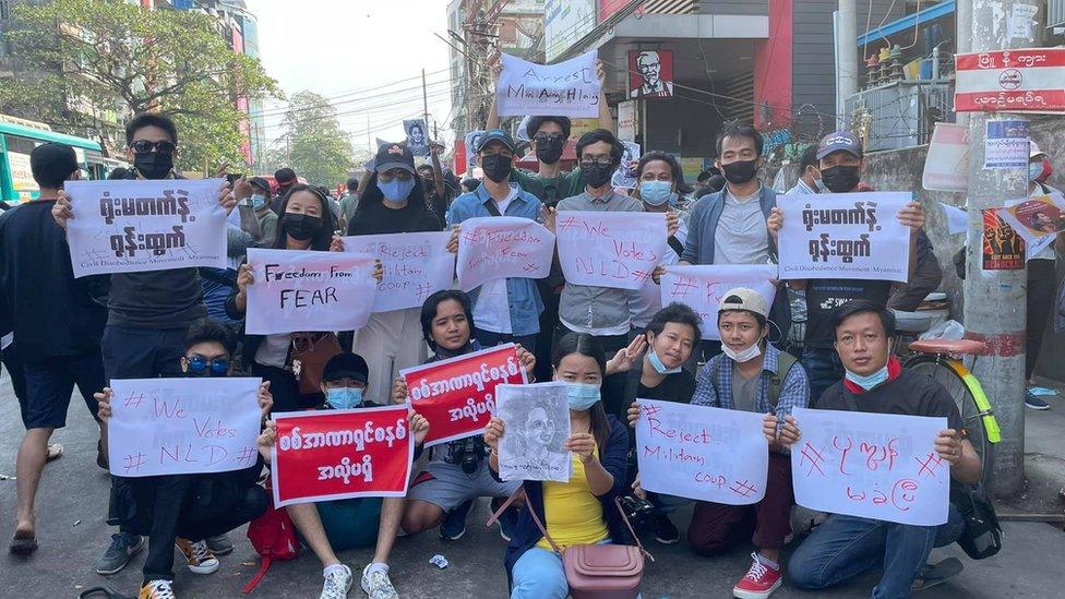 Han Lay protests with her friends