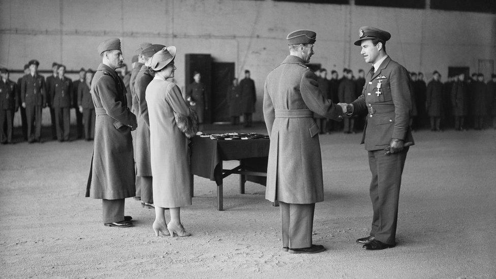 George VI and Queen Elizabeth giving medals at Duxford