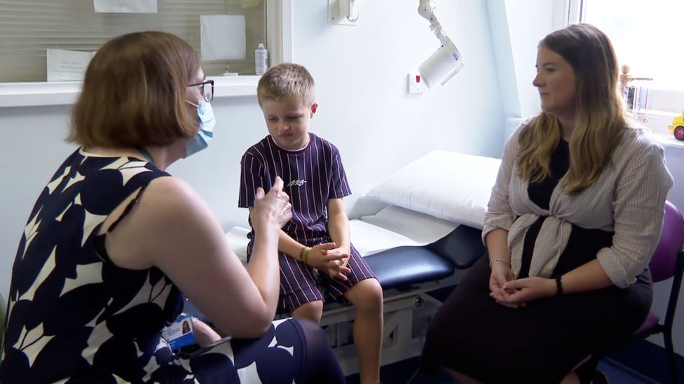 Charlie with mum Hannah and Dr Mathias